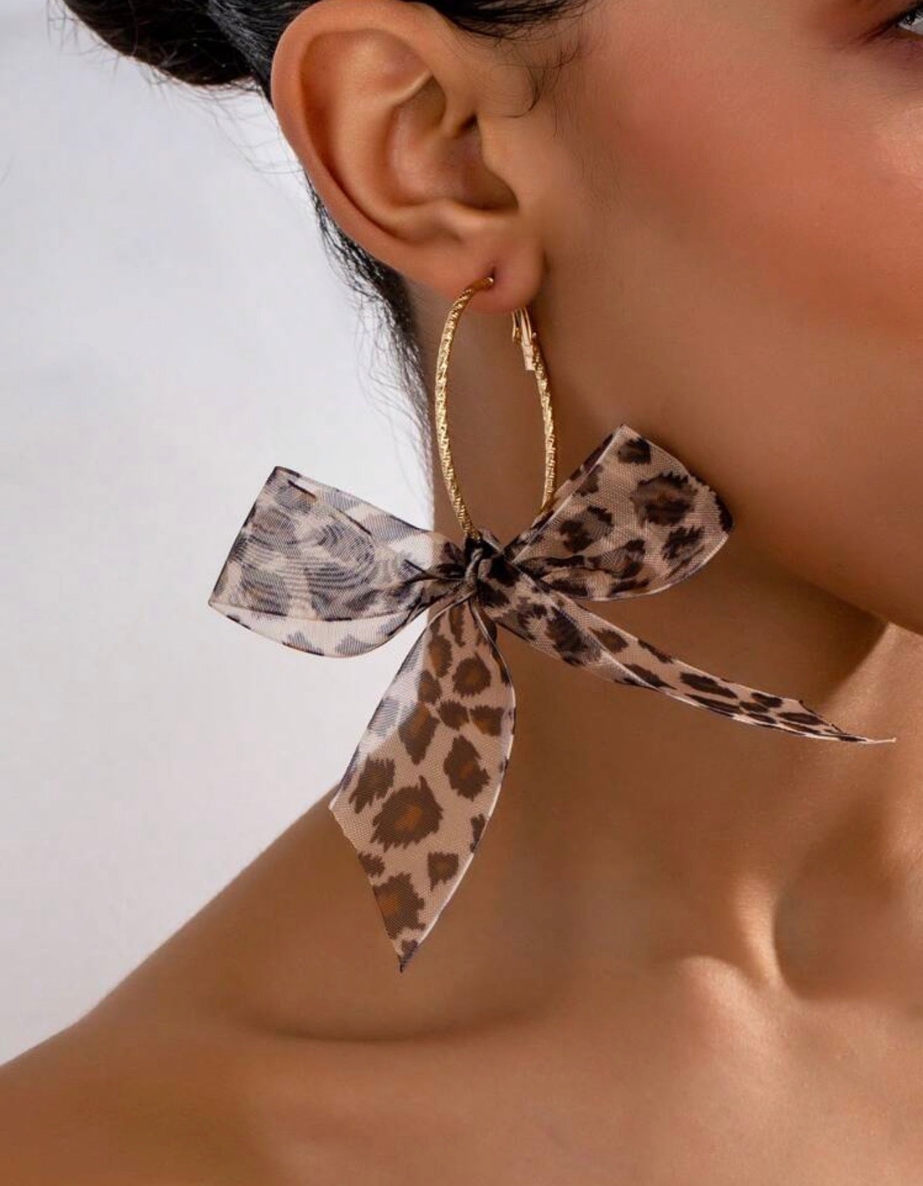 Leopard Print Bow Earrings – Chic Statement Accessories